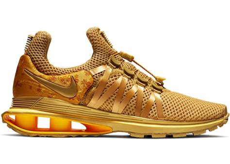 shox gravity metallic gold